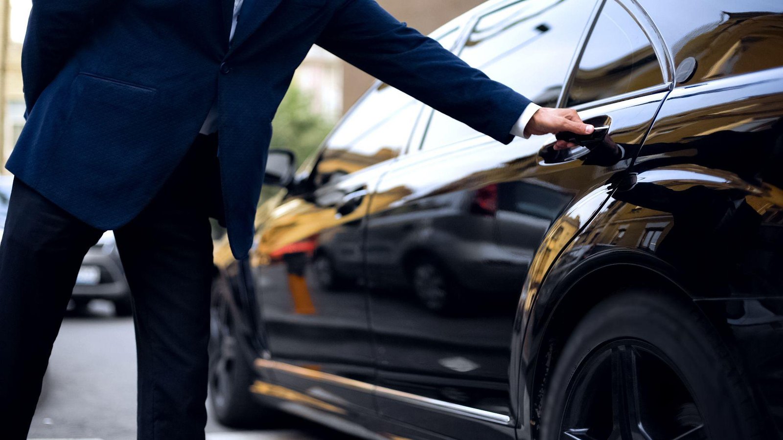 Professional uniformed chauffeur for Disney World airport transfer